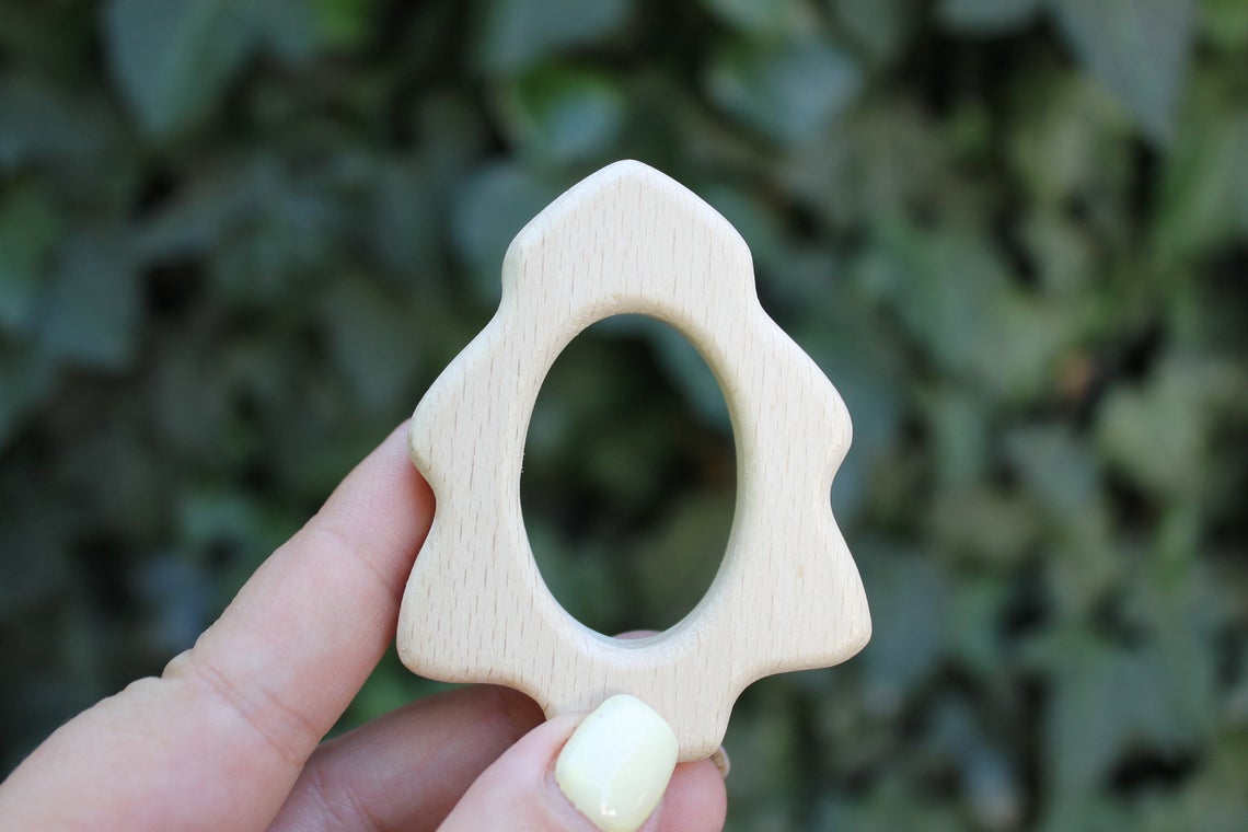 Teethers. Pendant wooden toy