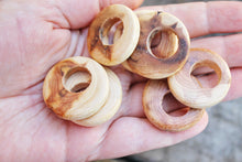 Load image into Gallery viewer, Set of 5 juniper wooden rings with displaced hole - natural eco friendly
